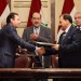 Satarem CEO Jerome Friler (left) shakes hands with an Oil Ministry refining official as Prime Minister Nouri al-Maliki (center), Oil Minister Abdul Karim Luaibi (right) and Deputy Prime Minister for Energy Hussain al-Shahristani (left) look on. (Source: Prime Minister's Office)
