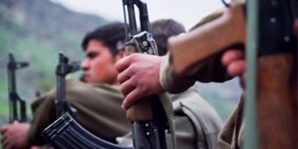 PKK #4_resizedforweb Kurdish guerrilla fighter of the PKK in the Qandil Mountains of northern Iraq. For decades, the PKK has been in armed conflict with the Turkish government over Kurdish rights and identity in Turkey. (DANIEL SMITH/Iraq Oil Report)