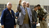Thamir Ghadhban (center) and Midland Refineries Co. Director General Dathar al-Kashab in a 2005 tour of the Daura refinery. (SABAH ARAR/AFP/Getty Images)