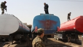 Tankers retroffited by a smugglers' operation to hide as much as half of their fuel load are discovered by the Iraqi Oil Police. (BEN LANDO/Iraq Oil Report)