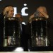 Russian Deputy Prime Minister Arkady Dvorkovich (left) and Iraqi Deputy Prime Minister Hussain al-Shahristani (right) look into a ceremonial barrel of crude from the Lukoil-operated West Qurna 2 field, on March 29, 2014, in Basra. The field began first commercial production at 120,000 bpd and is targeting as much as 400,000 bpd by the end of the year. (ALI ABU IRAQ/Iraq Oil Report)
