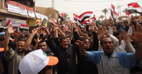 Residents of Falluja celebrate the Arab League summit and protest the central Iraqi government, which it blames for a lack of services and increased sectarian tension in the country. (JAMAL NAJI/Iraq Oil Report)