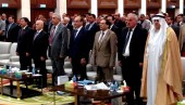 Iraq's top oil officials gather at the Al-Rashid Hotel in Baghdad on April 3, 2013, for a celebration of Iraq's latest oil transparency report. Attendees included Deputy Prime Minister for Energy Hussain al-Shahristani (second left); Oil Minister Abdul Karim Luaibi (third left); and Alaa Mohie el-Deen, the head of Iraq's Extractive Industries Transparency Initiative (center). (BEN VAN HEUVELEN/Iraq Oil Report/Metrography)