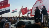 Tribes in the West Qurna area of Basra rally at the oil field operated by ExxonMobil to demand farmland compensation and jobs. Feb. 11, 2013. (ALI ABU IRAQ/Iraq Oil Report)