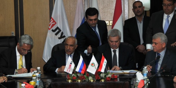 Lukoil President Vagit Alekperov (center right), South Oil Company Director General Dhia Jaffar (center left) and Petroleum Contracts & Licensing Directorate Abdul Mahdi al-Ameedi (left) sign the ammendment to the West Qurna 2 contract Jan. 17, 2013. (source: Oil Ministry)