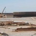 Workers build the first new storage at Fao in March 2011. (ALI ABU IRAQ/Iraq Oil Report)